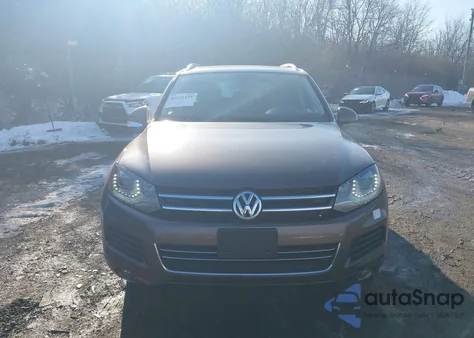 2014 Volkswagen Touareg 3.6L Lux from USA, damaged, VIN WVGEF9BP4ED008178